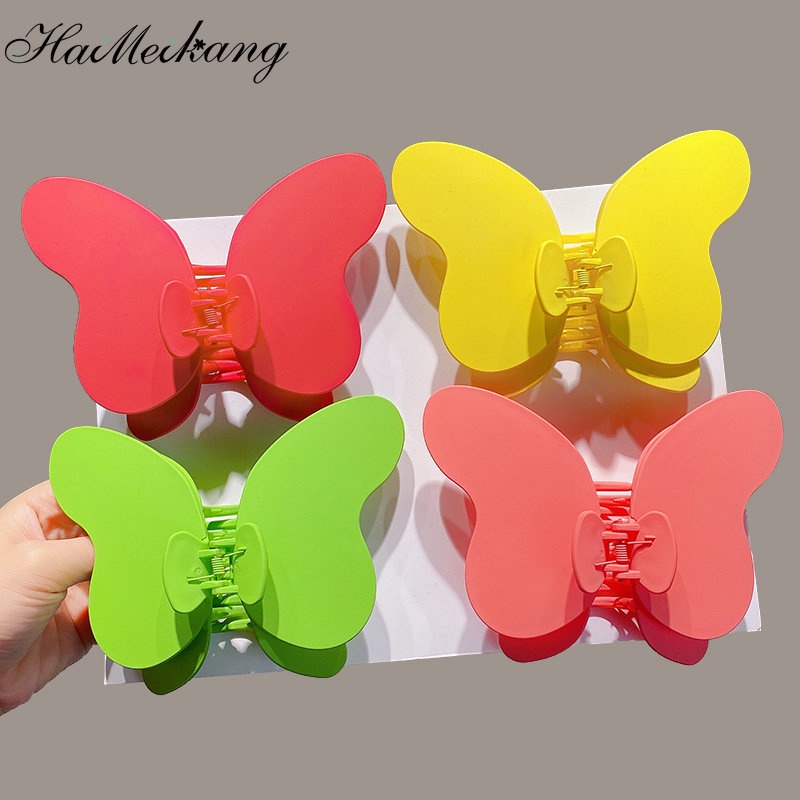 Kẹp tóc nơ bướm HAIMEIKANG bằng nhựa màu trơn thời trang Hàn Quốc