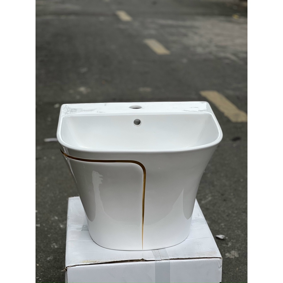 LAVABO TREO TƯỜNG  LIỀN KHỐI TRẮNG SỌC VÀNG