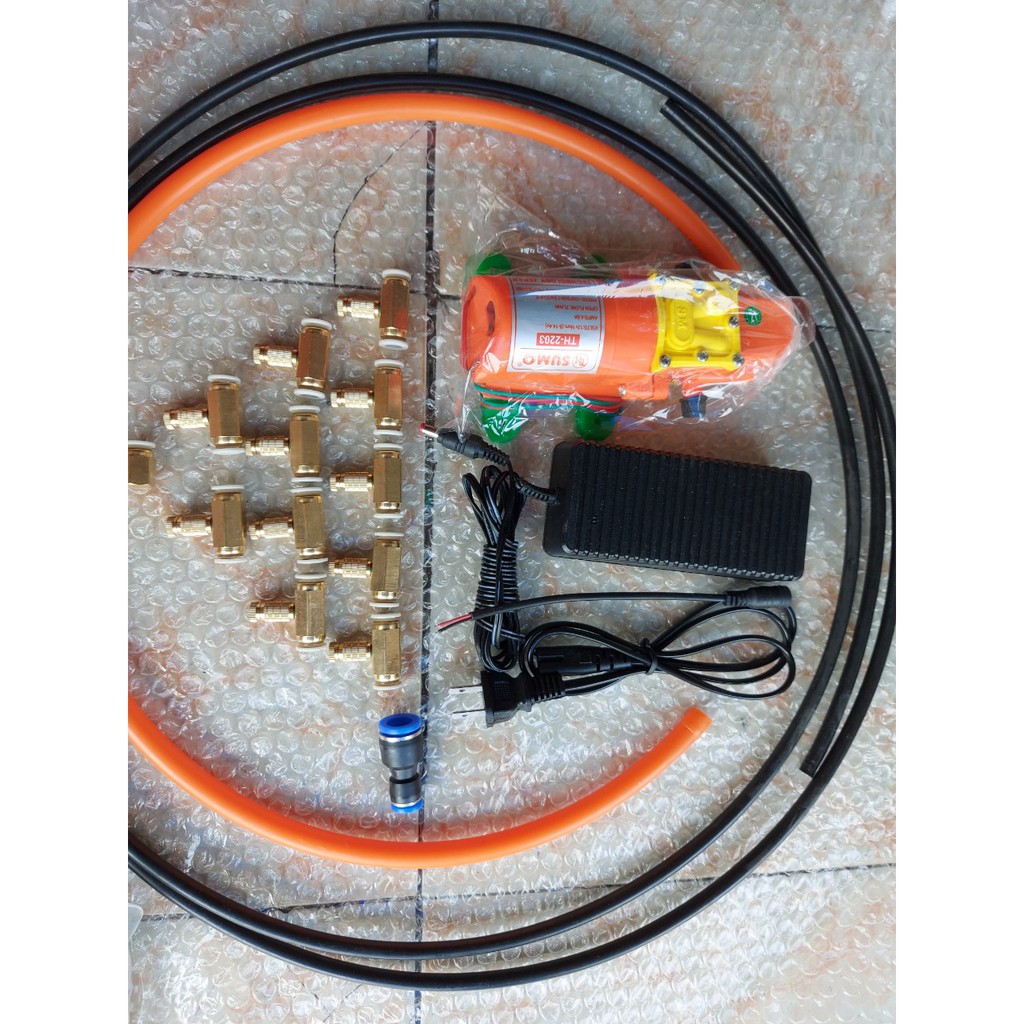 phun sương. bộ phun sương, tới lan. Bơm Sumo cam kèm ng,uồn 12v_5a. 20m dây phun. 15 béc đồng. 1m dây hút, lọc rác..