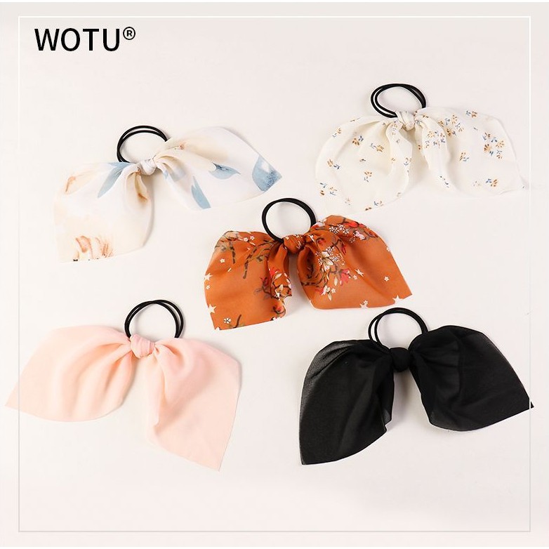 S05 Cột tóc vải nơ cánh tiên
