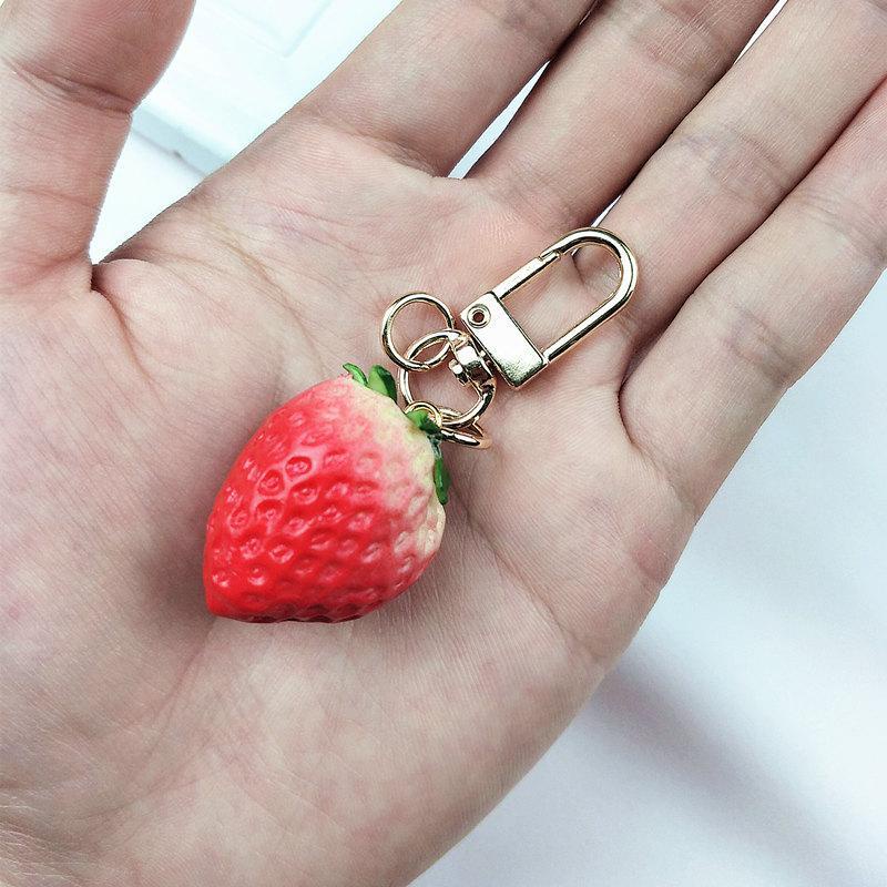 Móc Khóa Mềm Mại Hình Quả Dâu Tây Kiểm Soát Lượng Nhẹ Sáng Tạo Dễ Thương