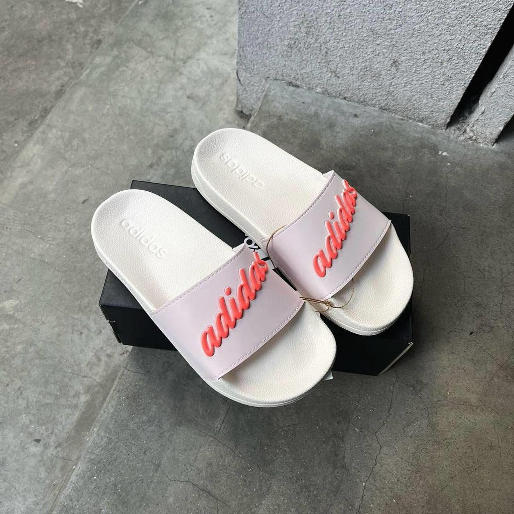 Dép chính hãng Adidas Adilette Shower nữ màu hồng nhạt logo cam