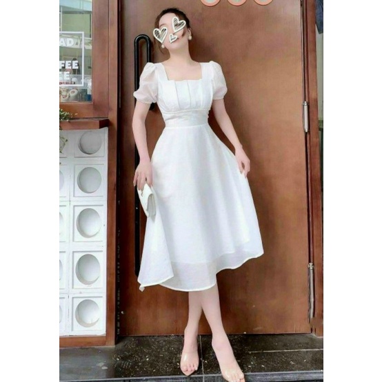 Đầm Midi trắng thiết kế ngực xếp viền ngọc.