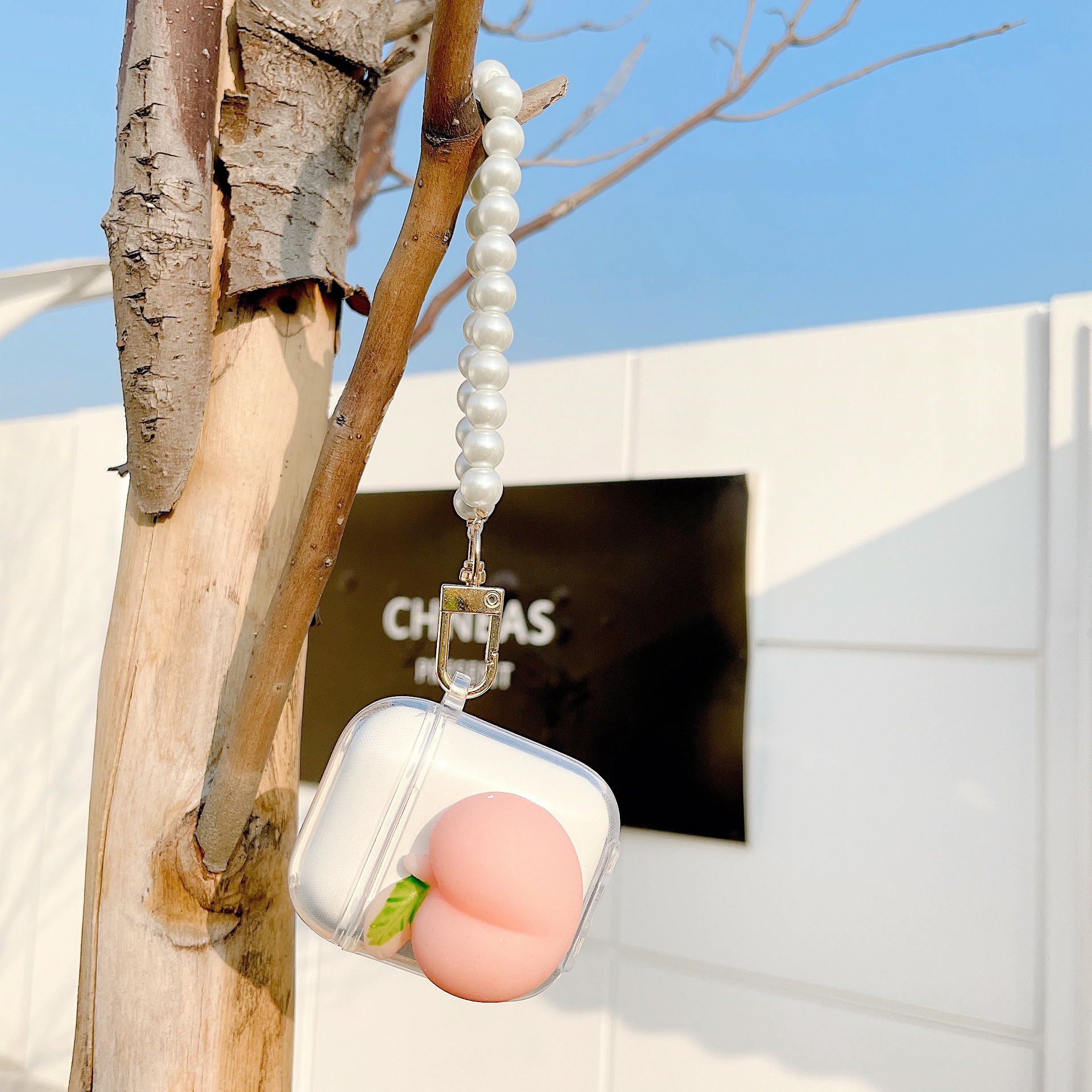 Vỏ bọc bảo vệ hộp đựng tai nghe Airpods 2/3 hình trái đào xinh xắn | BigBuy360 - bigbuy360.vn