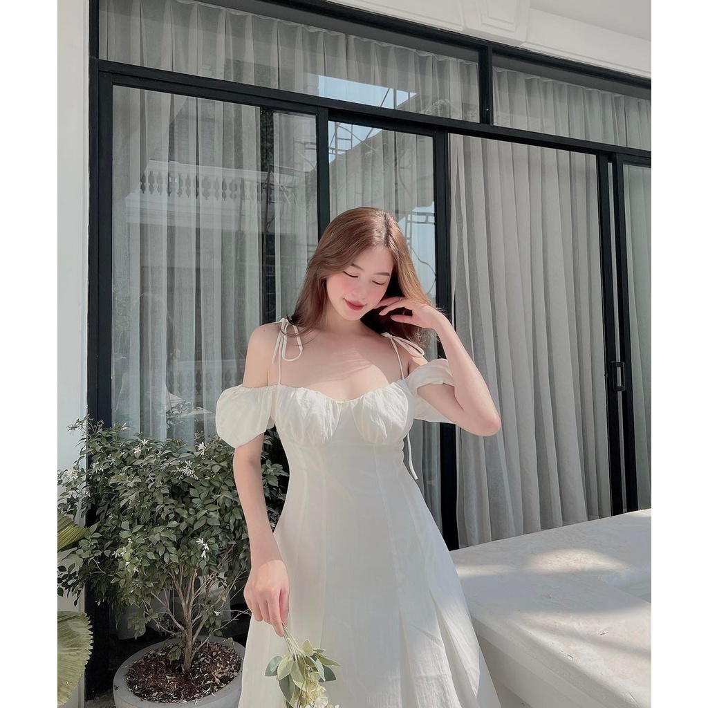 Đầm xòe nhún ngực 2 dây cột nơ tay phồng
