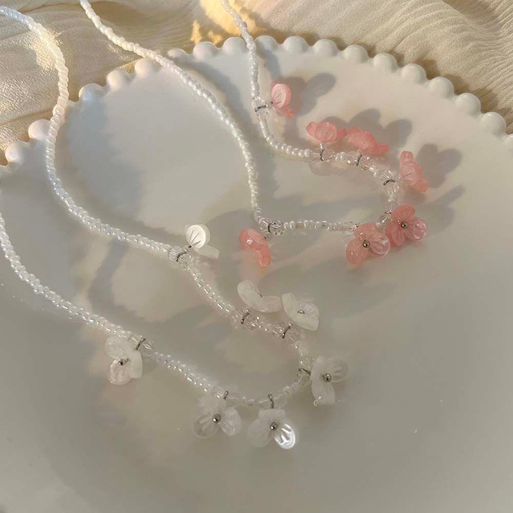 Vòng cổ Hạt Ngọc Trai Mặt Hoa Nhỏ Đơn Giản Phong Cách Bohemian Hàn Quốc Cho Bạn Gái