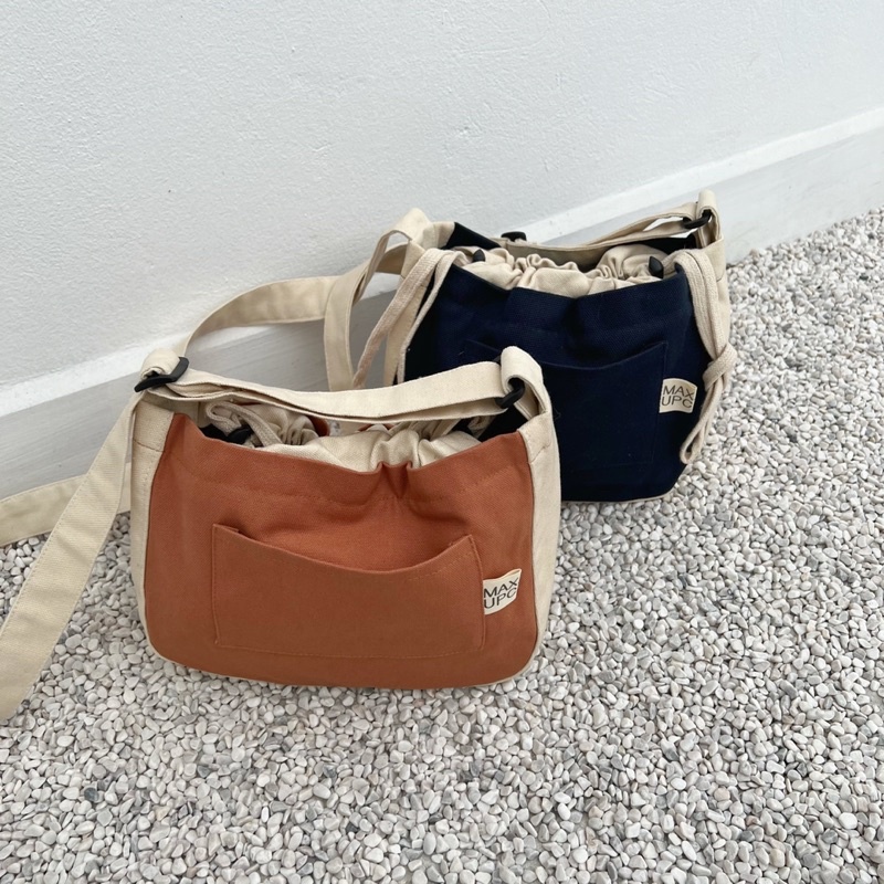 Túi Đeo Chéo “Mini Mandu Bag” Miệng Túi Dây Rút Vải Canvas
