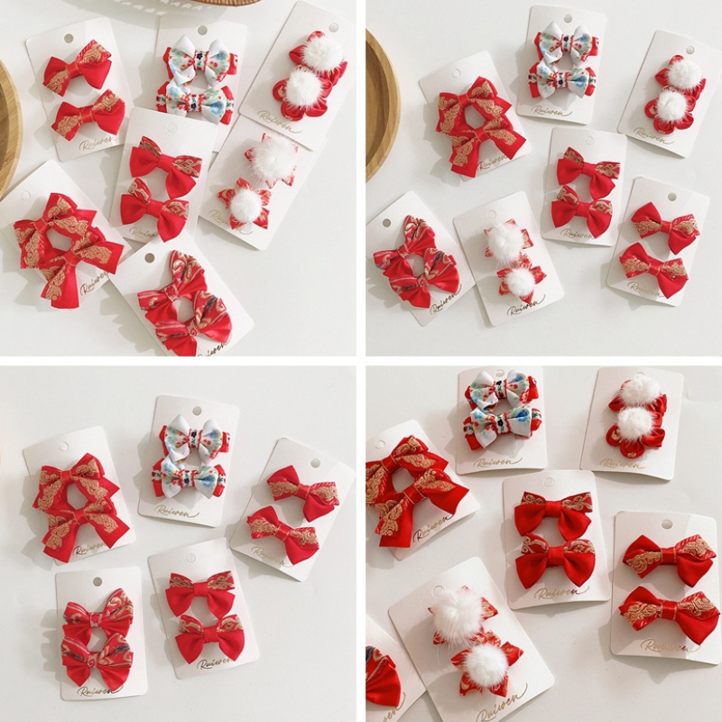 Bộ 2 kẹp tóc màu đỏ xinh xắn nhiều kiểu dáng làm quà tặng mừng năm mới cho bé gái