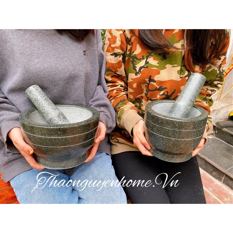 Cối đá tảng nguyên khối nặng trịch