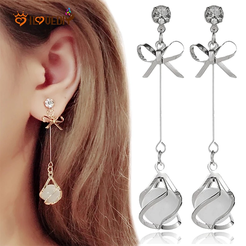 1 đôi bông tai dài đính nơ pha lê sang trọng cho cô dâu