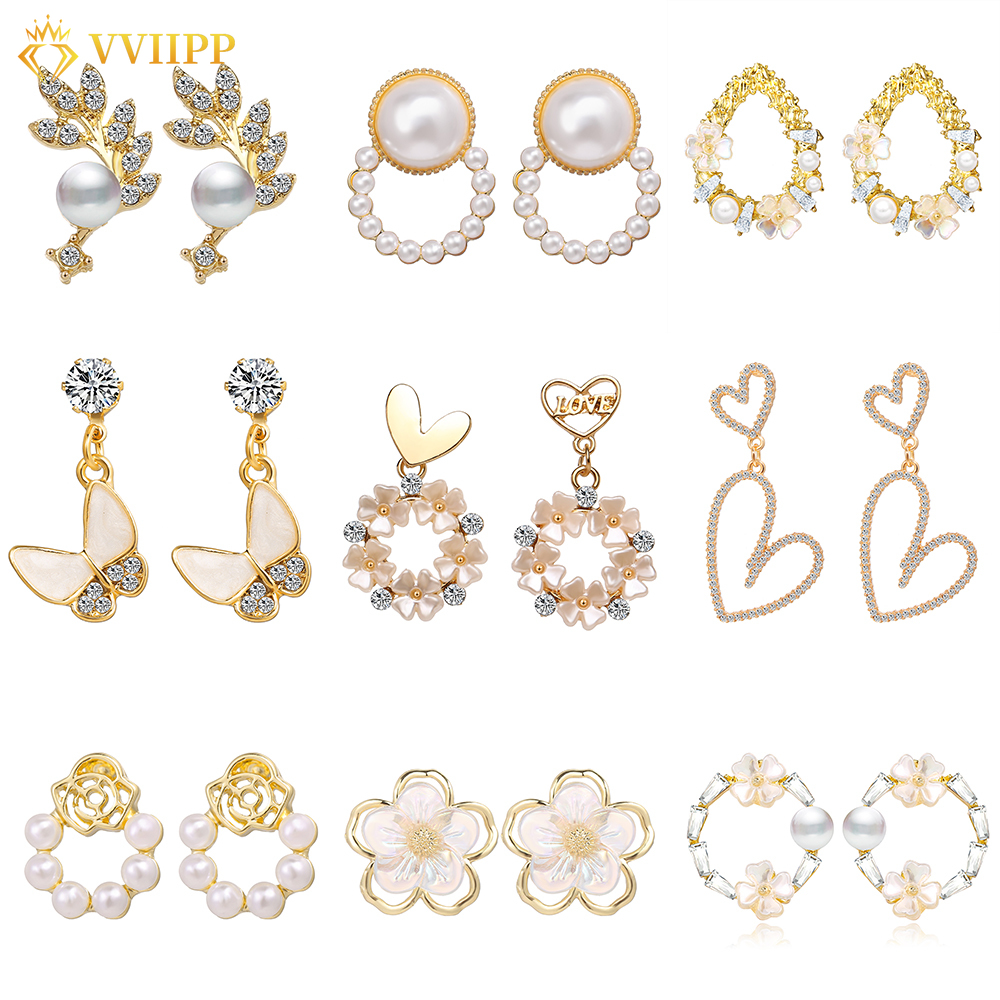 Hoa tai bằng hợp kim đính đá phối ngọc trai độc đáo