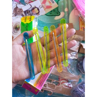 Que nặn mụn 2 đầu