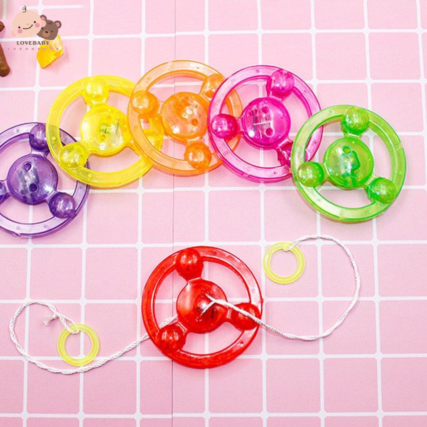 Đồ chơi bánh đà kéo dây trang trí LED sáng tạo dành cho bé