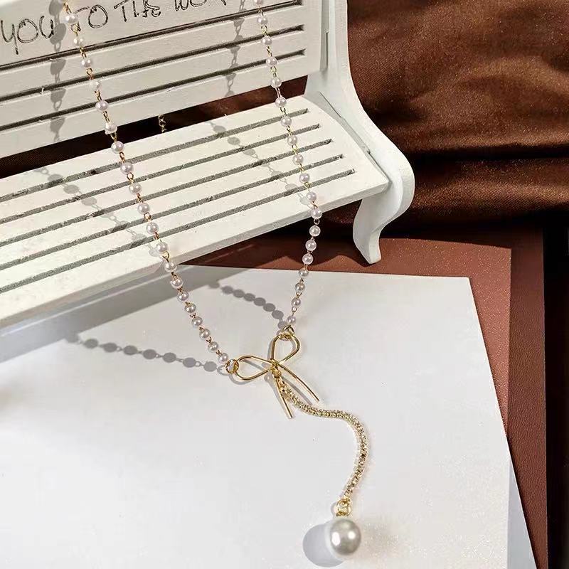 Vòng Cổ Chuỗi Ngọc Trai Thắt Nơ Phong Cách Hàn Quốc Độc Đáo Cho Nữ