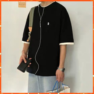 Áo thun tay lỡ cotton phối túi