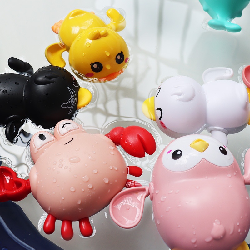 Đồ Chơi Thả Bồn Tắm Bò Sữa Chèo Thuyền Phun Nước Vặn Cót Bơi Lội Cho Bé Thích Thú Vận Động Khỏe Mạnh