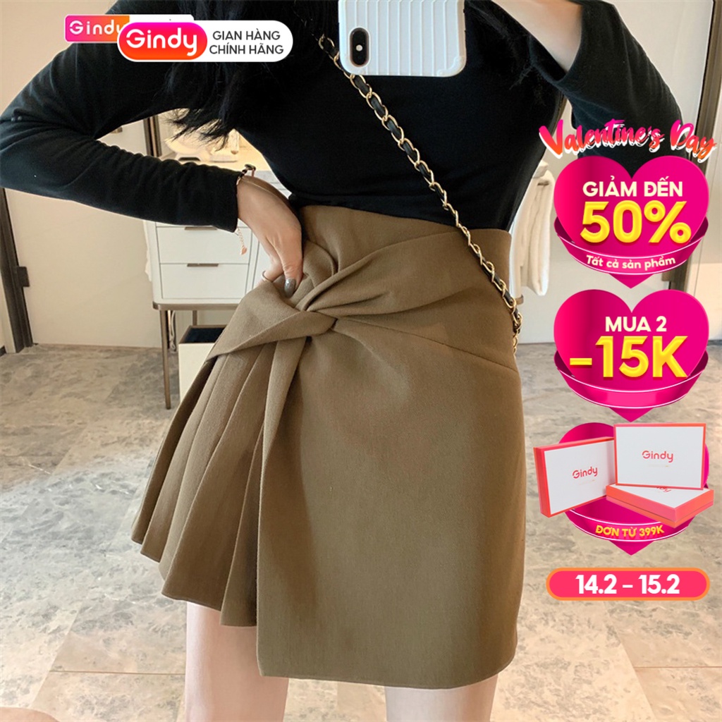 Chân váy nữ công sở chữ A GINDY dáng ngắn phối nơ xếp ly vạt lệch thời trang hàng thiết kế thời trang nữ V20021
