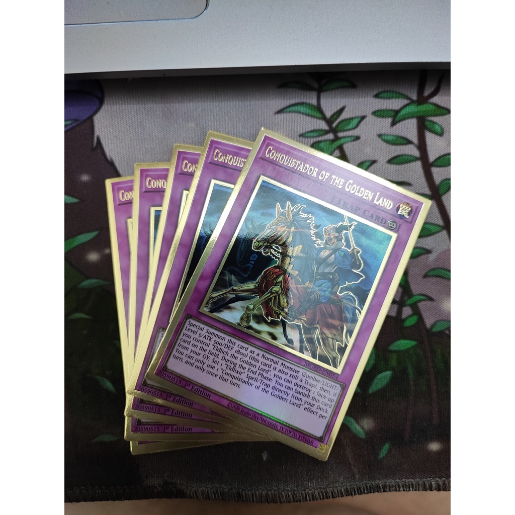 1 lá thẻ bài Conquistador of the Golden Land - MGED-EN054 - Premium Gold Rare 1st Edition