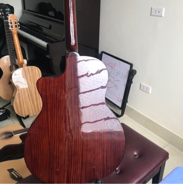 Đàn Guitar giá rẻ. Et15 giá rẻ và có ty chỉnh cần nên không lo cong cần