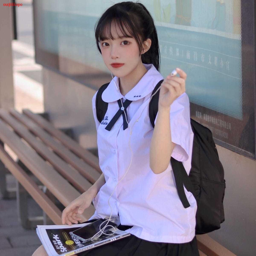 Bộ đồng phục của trường đại học kéo dài mặc váy thành áo phụ nữ áo sơ mi nữ đồng phục nữ sinh Thái Lan