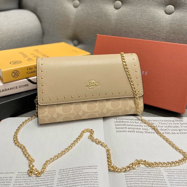 Túi - ví cầm tay viền đinh