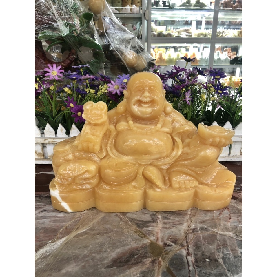 Tượng Phật Di Lặc ngồi tựa bao tiền cầm thỏi vàng và gậy như ý phong thủy đá ngọc hoàng long - Dài 30cm