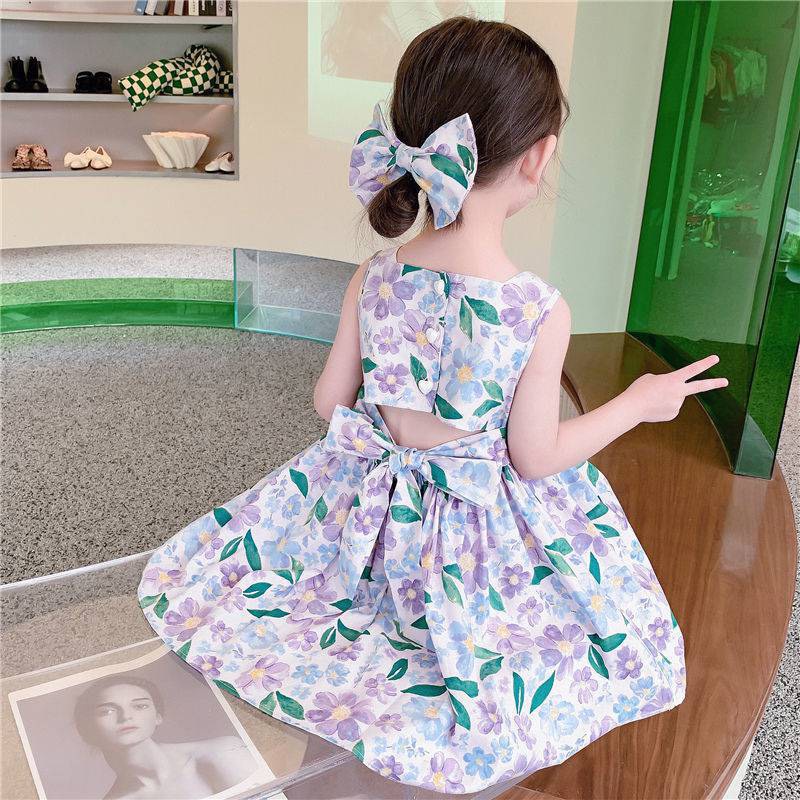 Váy bé gái sát nách hoa to cài cúc lưng nơ lưng 2 mầu Tím Hồng XHN1018