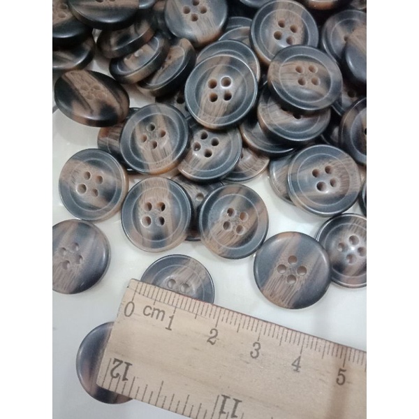 Cúc nhựa size 1.8cm.