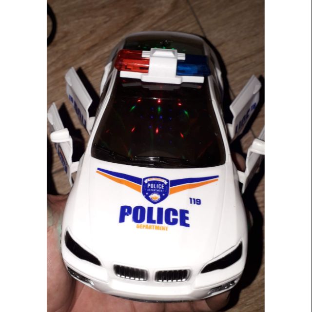 Xe mô hình xe cảnh sát chạy PIN mở cửa có nhạc và đèn Led rất đẹp (tặng kèm PIN)