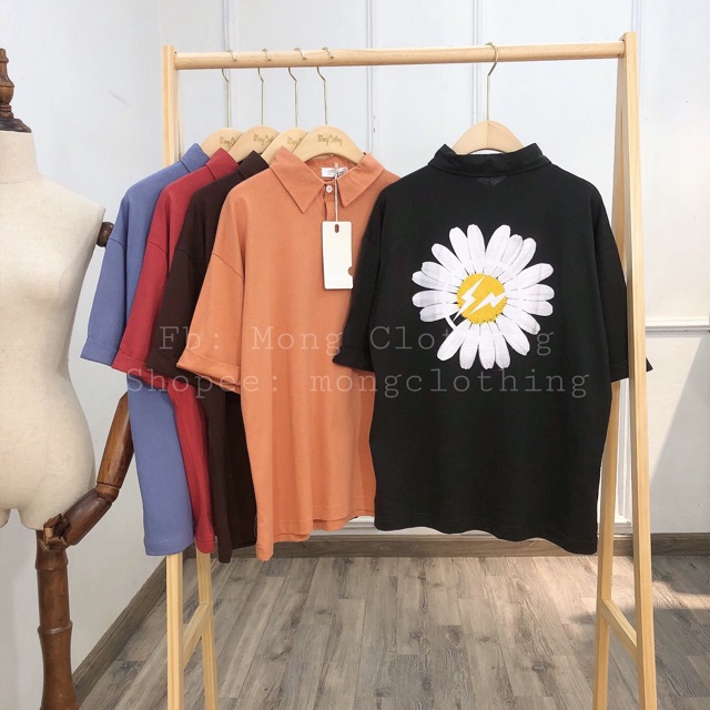 Áo polo hoa cúc nam nữ đều mặc được.