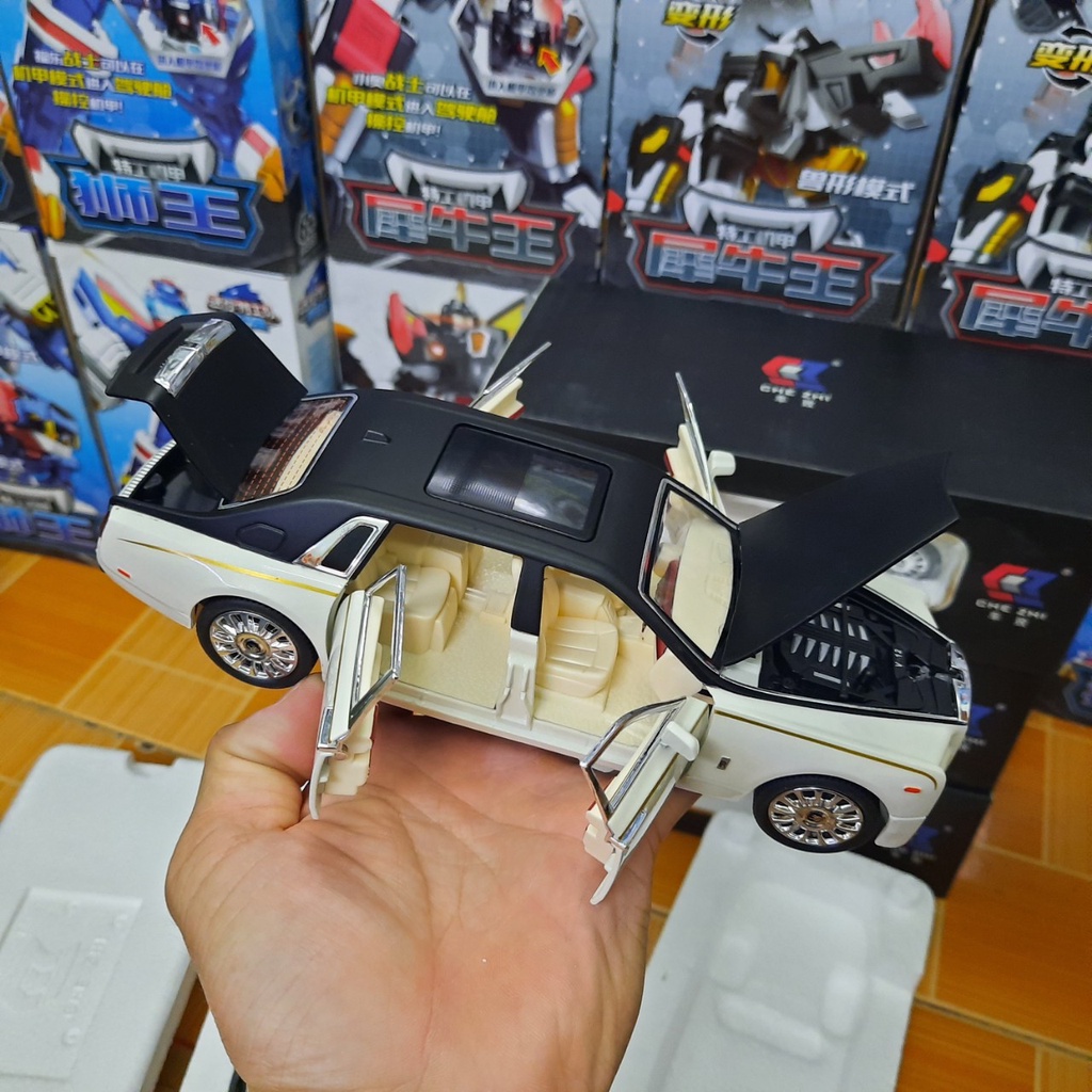 Mô hình xe ô tô Rolls- Royce Phantom tỉ lệ 1:24 hãng Che Zhi đồ chơi trẻ em bằng kim loại có âm thanh và đèn mở được cửa