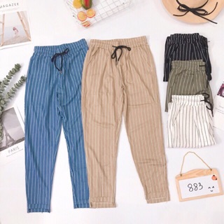 Quần baggy kẻ sọc gấu lệch chất liệu cotton giấy