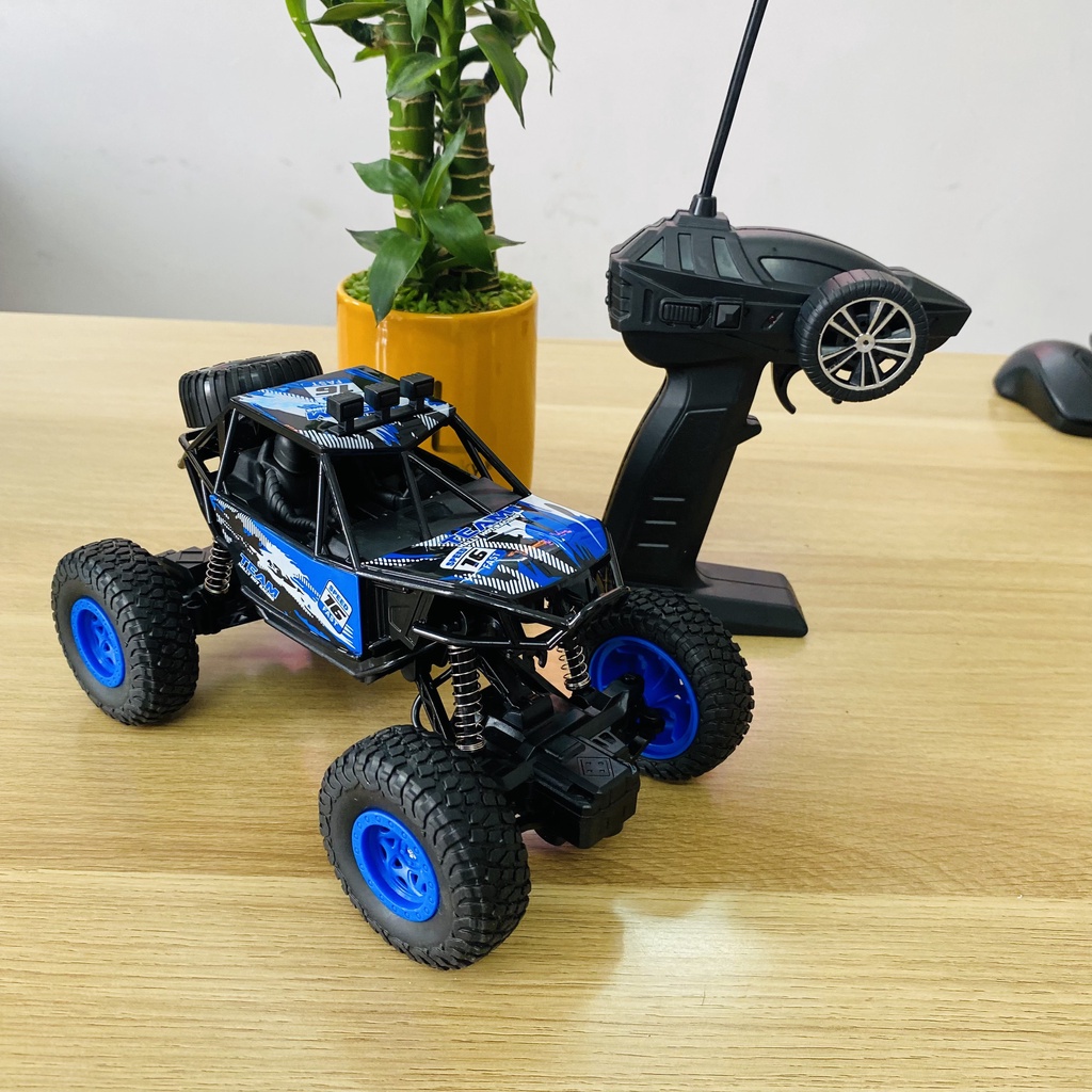 Xe ô tô địa hình leo núi điều khiển từ xa 4 chiều pin sạc XB 1009