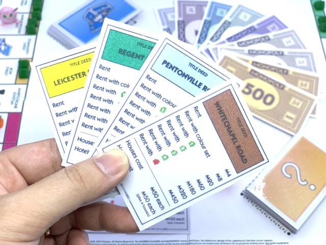 Cờ tỷ phú Monopoly đã ép plastic