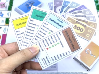 Cờ tỷ phú Monopoly đã ép plastic