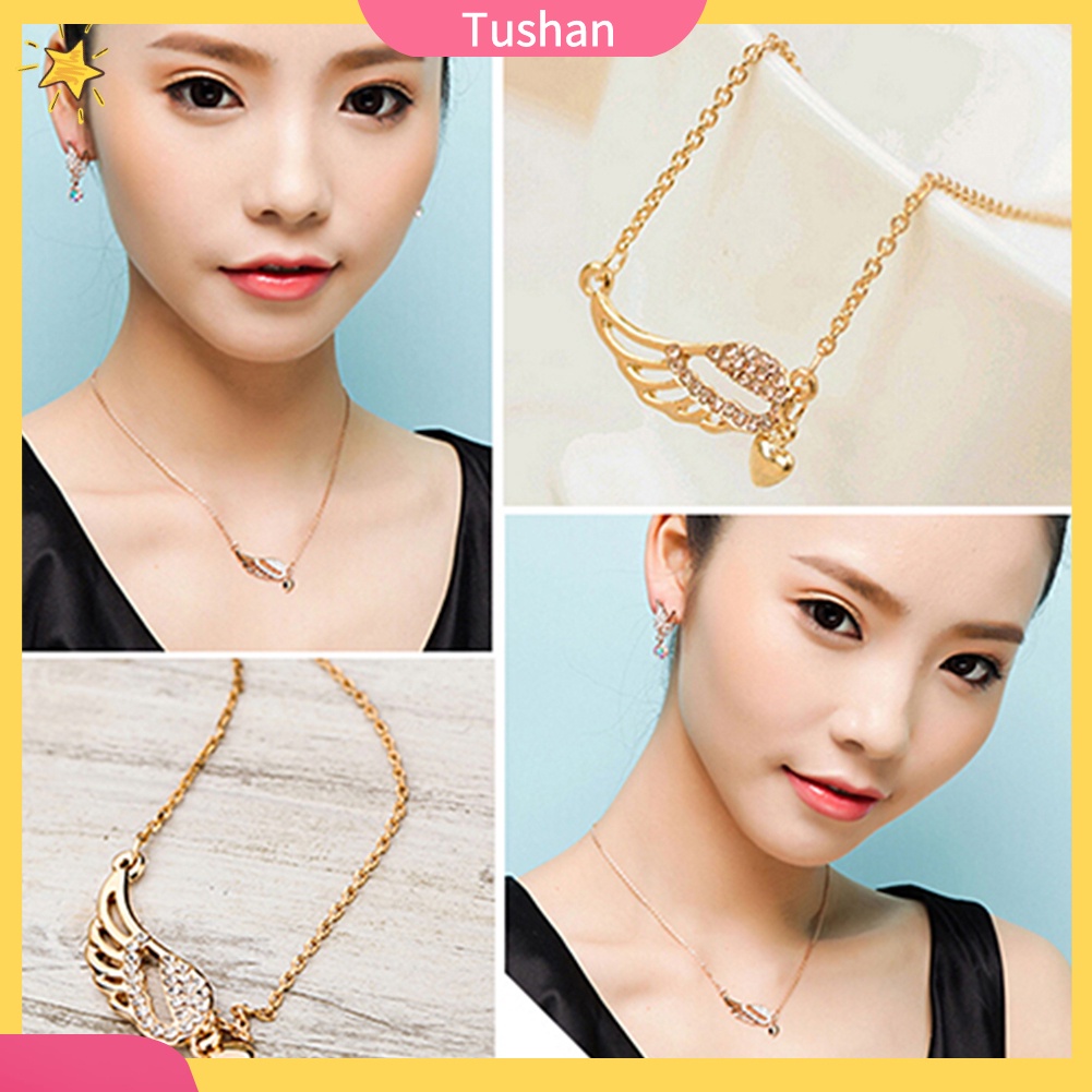 Dây chuyền mặt trái tim và đôi cánh thiên thần tush _