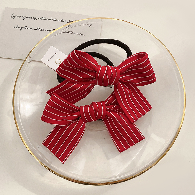 Thun cột tóc gắn nơ dễ thương phong cách Hàn Quốc