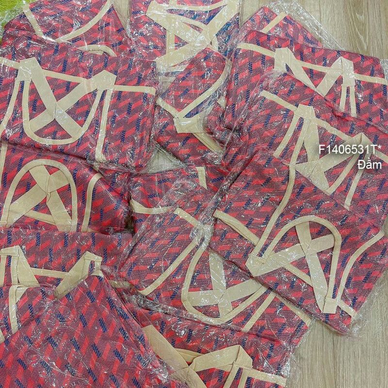 Đầm body len họa tiết phối dây chéo lưng sátn