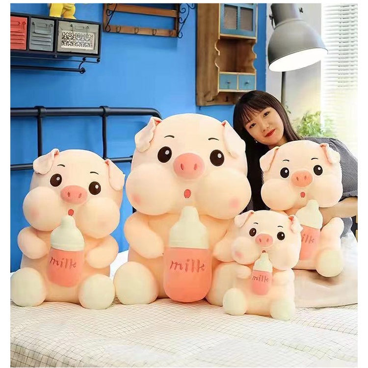 Chú Heo Ôm Bình Sữa Nhồi Bông Dễ Thương Dùng Làm Quà Tặng Sinh Nhật Cho Bé Gái
