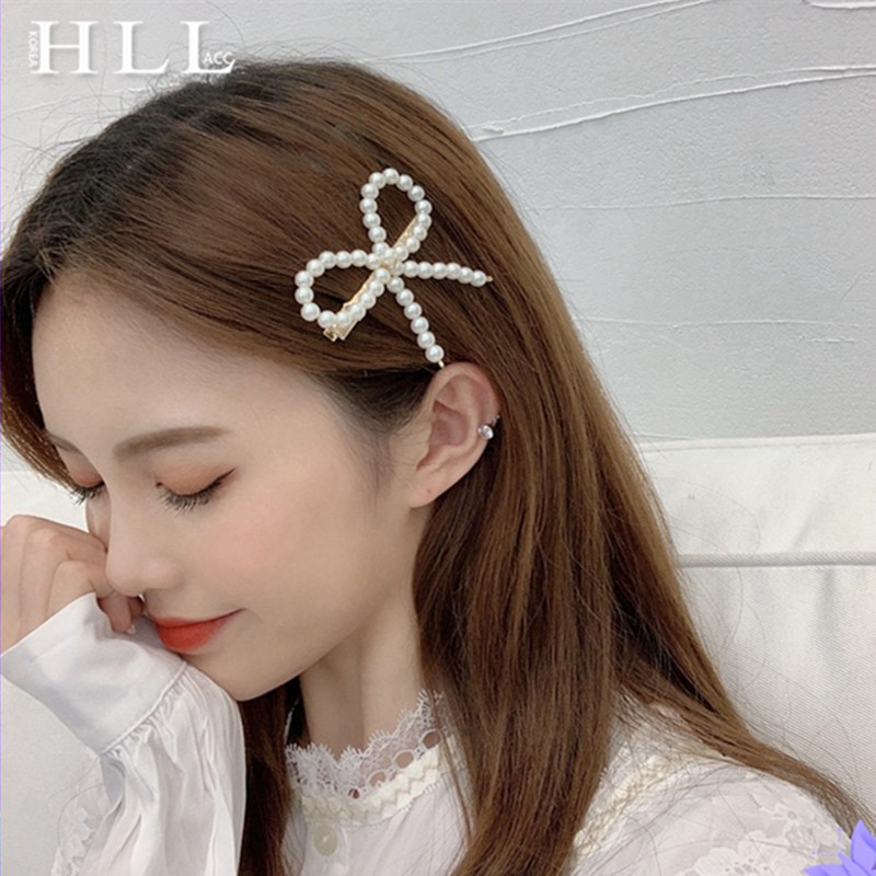 Kẹp tóc hình nơ đính ngọc trai đẹp mắt cho nữ