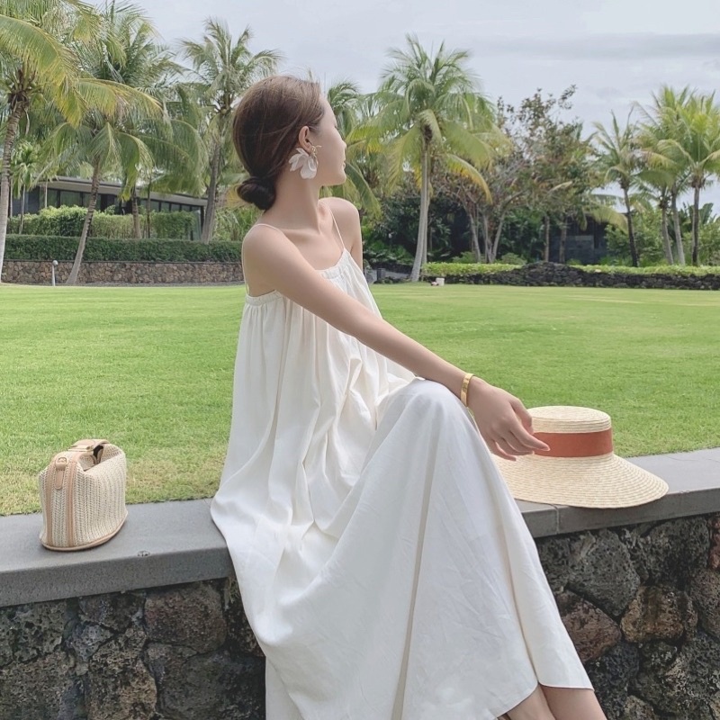 Đầm dây maxi trắng đi biển dáng xoè rộng rãi