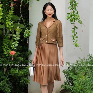 Set áo vest lửng mix với chân váy dập li