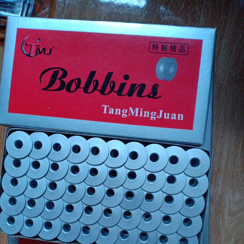 Hộp 100 suốt nhôm máy may 1 kim