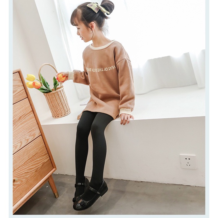 Quần tất lót lông cho bé màu da chân đen, trắng