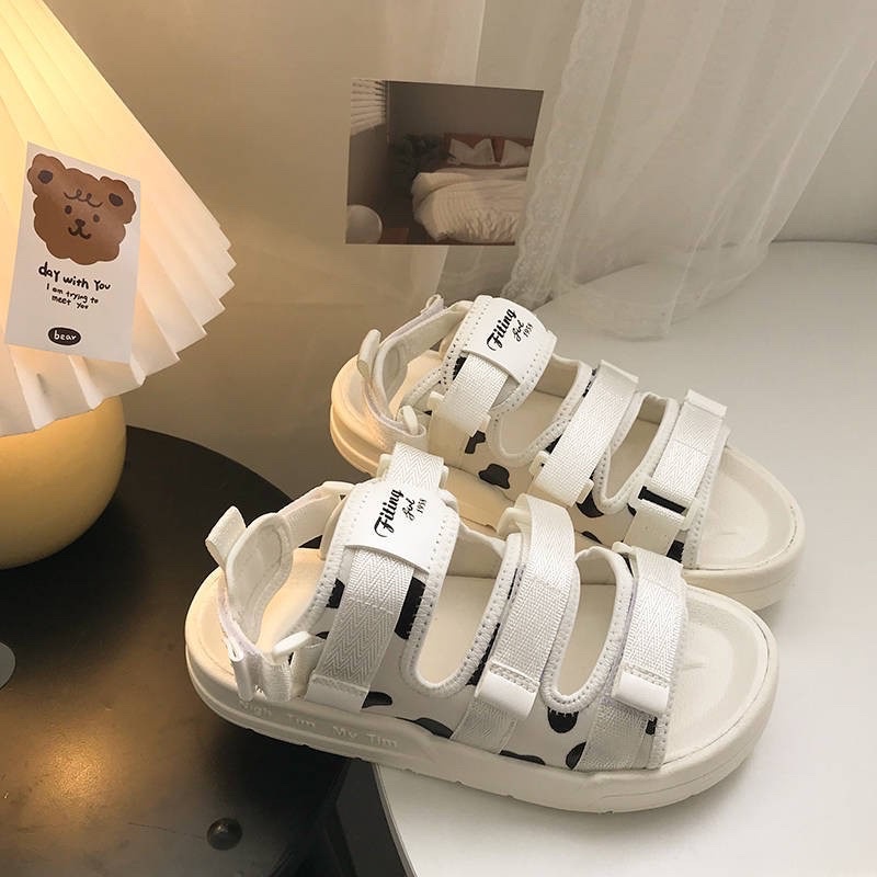 Sandal đi học hoạ tiết bò sữa quai điều chỉnh siêu xinh