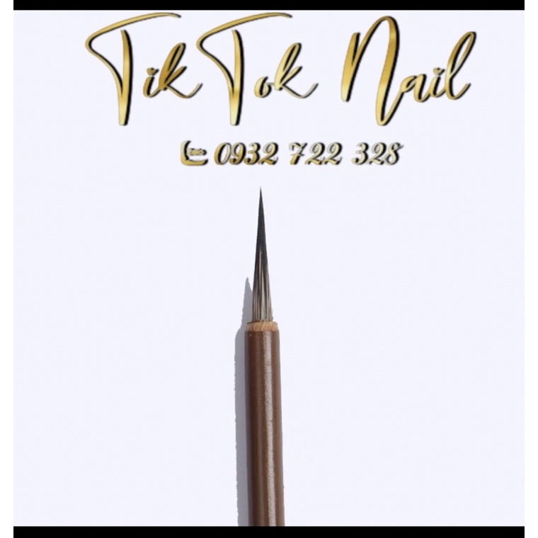 cọ vẽ và tô cán gỗ