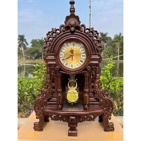 Đồng hồ quả lắc gỗ mun cao cấp