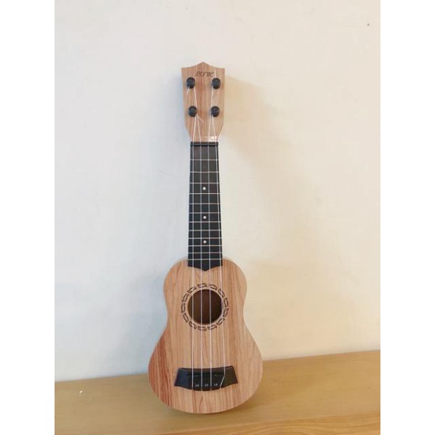 [Đàn Ghita Nhựa Cho Bé - Đàn Ukulele Mini Giả Gỗ