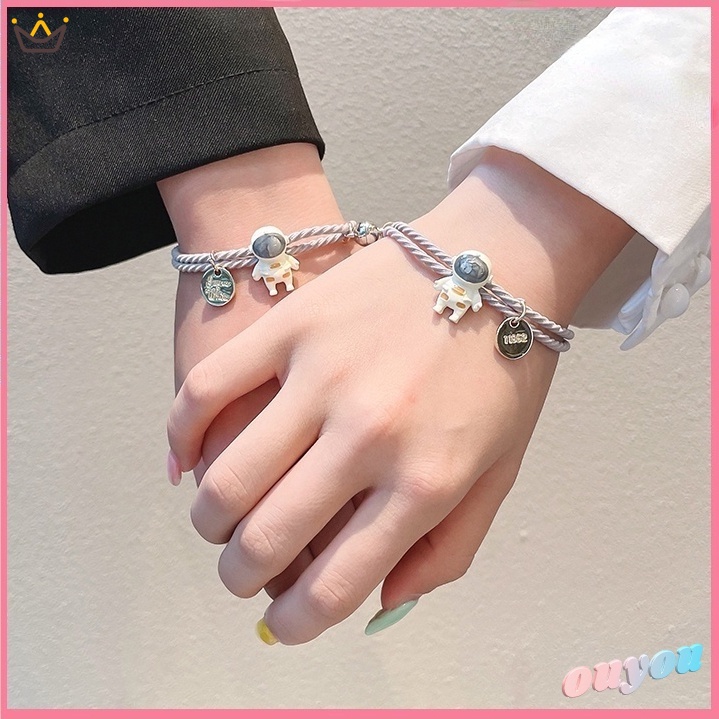 Vòng Tay Nam Châm Hình Phi Hành Gia Sáng Tạo Cho Cặp Đôi