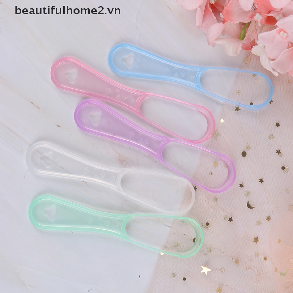 Dụng cụ cạo làm sạch lưỡi tiện dụng cho nha khoa 2.vn